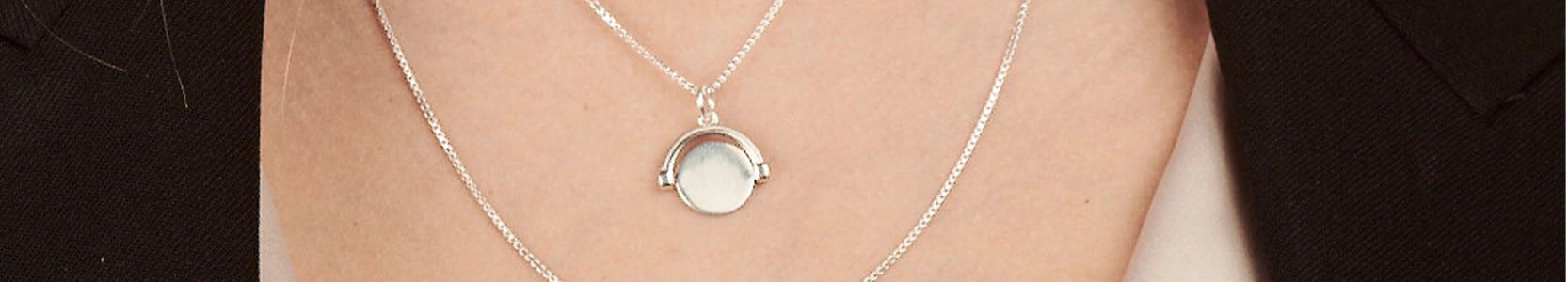 Silver spinner necklace featured in summer sale